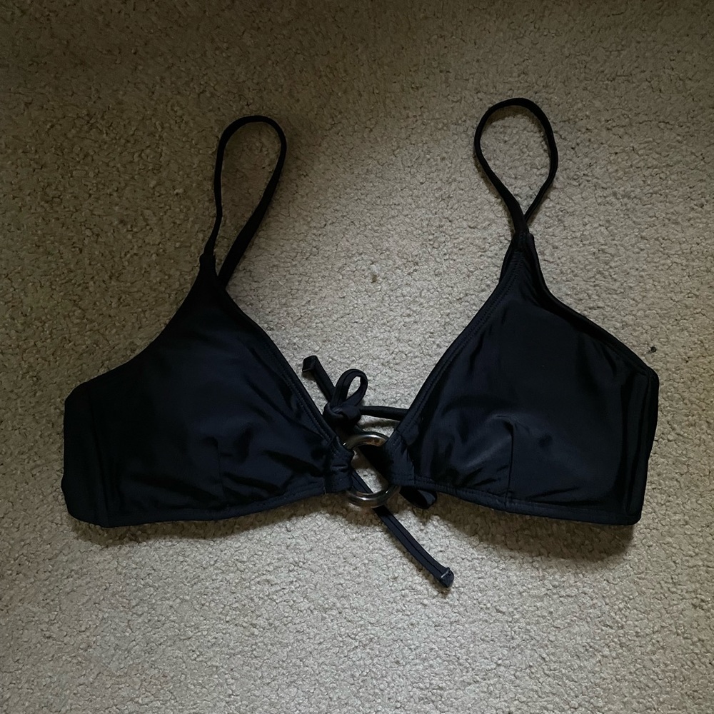black bikini top with ring in the middle